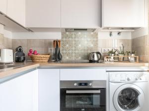 Kuchyňa alebo kuchynka v ubytovaní Nayber Gavia - Nuevo y centrico apartamento en Cordoba