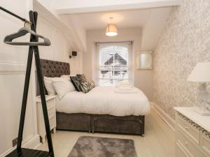 Ένα ή περισσότερα κρεβάτια σε δωμάτιο στο Stones Throw