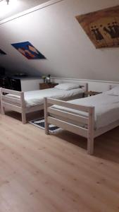 Ένα ή περισσότερα κρεβάτια σε δωμάτιο στο Royale bovenwoning