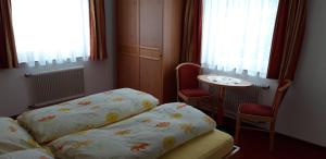 Postel nebo postele na pokoji v ubytování Haus Kristall