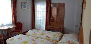 Postel nebo postele na pokoji v ubytování Haus Kristall
