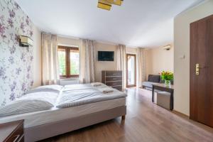 Posteľ alebo postele v izbe v ubytovaní Eskapada