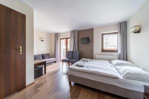 Posteľ alebo postele v izbe v ubytovaní Eskapada