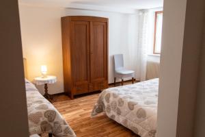 Ένα ή περισσότερα κρεβάτια σε δωμάτιο στο Tal Borc