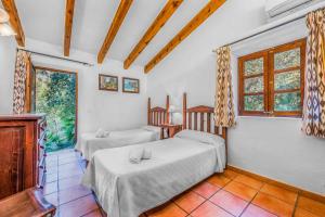 Postel nebo postele na pokoji v ubytování Cala San Vicente - 36717 Mallorca + 31 fotografií