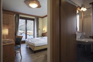 Postel nebo postele na pokoji v ubytování Ariston Lake View Hotel