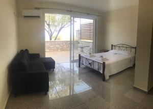 Postel nebo postele na pokoji v ubytování Nereids Apartments-Thetis