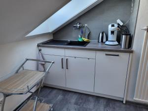 Virtuvė arba virtuvėlė apgyvendinimo įstaigoje Lounge 4 Singleapartment