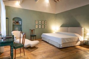 Posteľ alebo postele v izbe v ubytovaní Castello di Fonterutoli Wine Resort