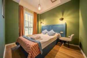 Katil atau katil-katil dalam bilik di Raimond Palace Hotel