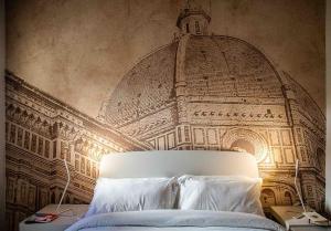 Posteľ alebo postele v izbe v ubytovaní Acacia Firenze - Girasole