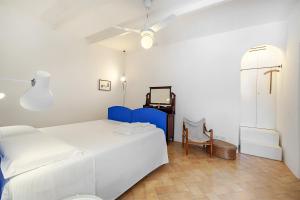 Posteľ alebo postele v izbe v ubytovaní Casa Rosa