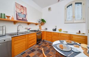Kuchyňa alebo kuchynka v ubytovaní Casa Rosa