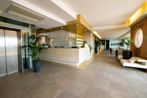 a lobby of a hospital with a reception counter at Smy Aran Blu Roma Mare in Lido di Ostia