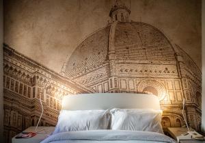 A bed or beds in a room at Acacia Firenze - Girasole