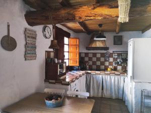 Kuchyň nebo kuchyňský kout v ubytování La Casita de Betania
