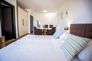 Posteľ alebo postele v izbe v ubytovaní Rooms Margarita
