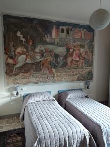 Postel nebo postele na pokoji v ubytování Riflessi d'Arte