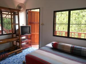 TV a/nebo společenská místnost v ubytování Ban Sabai Sabai Guest House