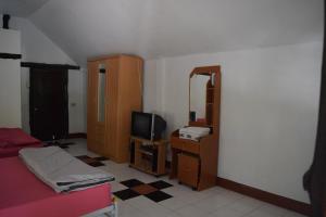 Postel nebo postele na pokoji v ubytování Ban Sabai Sabai Guest House