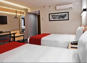 Postel nebo postele na pokoji v ubytování Hotel Best Place Express