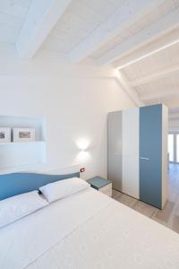 Giường trong phòng chung tại La Retara Affittacamere