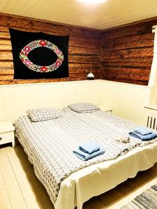 Cama o camas de una habitación en Vanatoa Taluhotell
