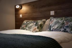 Ein Bett oder Betten in einem Zimmer der Unterkunft Auberge du Prévoux