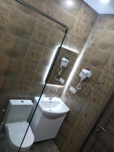 Koupelna v ubytování Roshka Apartment 307