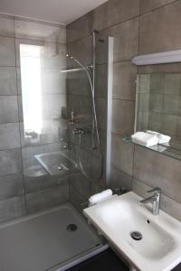 Vannituba majutusasutuses Auberge du Prévoux
