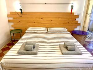 Cama o camas de una habitación en L'Officina