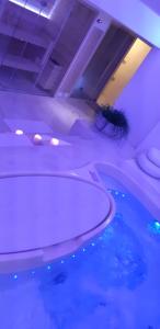 a swimming pool with blue water in an airplane at Dimora TerraNostra&Spa in Ugento