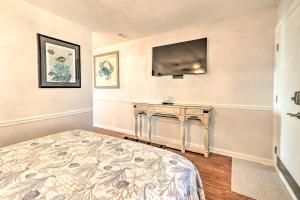 A bed or beds in a room at Oceanfront Condo Heated Pool and Steps to Beach!