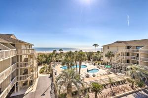 A view of the pool at Oceanfront Condo Heated Pool and Steps to Beach! or nearby