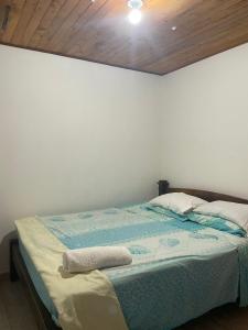 Katil atau katil-katil dalam bilik di Apartamento guatape