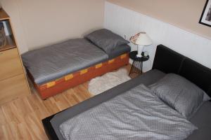 Postel nebo postele na pokoji v ubytování Ubytování Dolní Dobrouč