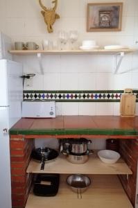 O bucătărie sau chicinetă la Casa La Pizarra