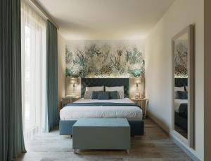 a bedroom with a large bed and a large window at PFA Hotel Viareggio in Viareggio