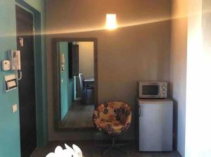 A kitchen or kitchenette at Villa Mozzafiato con Jacuzzi o Camino Toscana Montepulciano