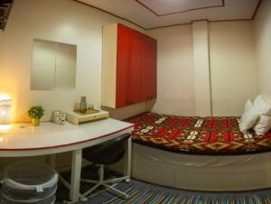 Postel nebo postele na pokoji v ubytování Gamaleya Boutique Hotel