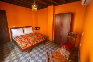 Postel nebo postele na pokoji v ubytování Gamaleya Boutique Hotel