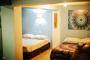 Postel nebo postele na pokoji v ubytování Acogedor apartaestudio + 24 fotografií