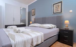 Кровать или кровати в номере Villa M&M - ZF Hvar