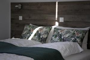 Voodi või voodid majutusasutuse Auberge du Prévoux toas