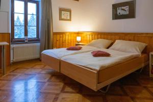 Voodi või voodid majutusasutuse Auberge du Prévoux toas