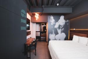 Llit o llits en una habitació de HOTEL RIO RITA