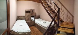Letto o letti in una camera di Lisaneli