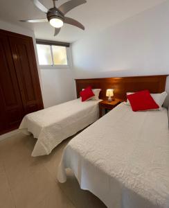 Postel nebo postele na pokoji v ubytování Appartement à Playa Paraiso