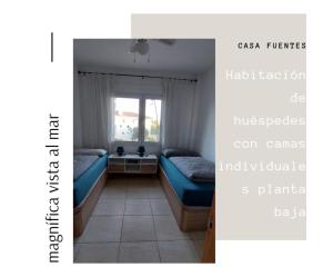 Posteľ alebo postele v izbe v ubytovaní Casa Fuentes Vista al mar Almuñecar - Haus Fuentes mit beeindruckendem Meerblick in Almuñecar