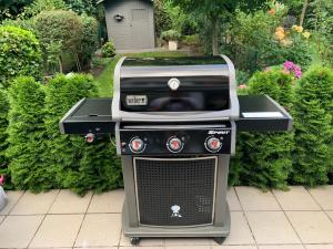 a toaster and a grill sitting on a patio at Casa Arturo Düsseldorf - Flughafen, Messe und City 3 km in Düsseldorf